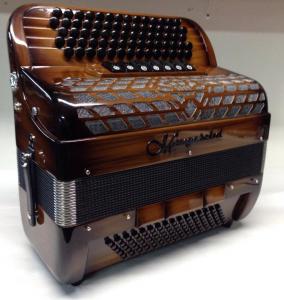 Chromatic button accordion of 44 notes (77 buttons) and 96 bass 