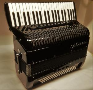 Piano accordion of 41 key and 120 bass with amplifying tone chamber (cassotto) 