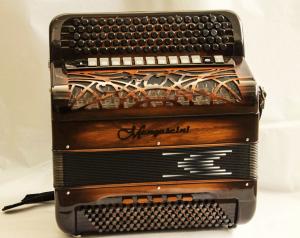 Chromatic button accordion of 56 notes (92 buttons) and 120 bass with amplifying tone chamber (cassotto) 